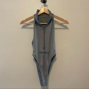 Grey stretchy French cut zip up bodysuit (small)